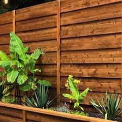 How A Wooden Privacy Fence Enhances Your Friendswood Residential Landscaping